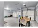 A clean, spacious garage with painted walls, epoxy floors and three garage doors at 10236 Arctic Edge Dr, Indianapolis, IN 46239