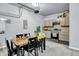 A spacious garage featuring a dining table and a kitchenette at 10236 Arctic Edge Dr, Indianapolis, IN 46239