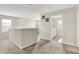 Second floor hallway featuring carpet and a laundry room at 10236 Arctic Edge Dr, Indianapolis, IN 46239