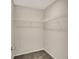 A walk-in closet featuring wire shelving around the top of the wall, for ample storage space at 10236 Arctic Edge Dr, Indianapolis, IN 46239