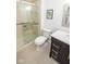 Bathroom featuring a glass shower door, toilet, and vanity with contemporary fixtures at 1046 Timber Creek Dr # 3, Carmel, IN 46032