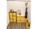 Organized closet space with storage shelves and wood-style flooring for effective organization at 1046 Timber Creek Dr # 3, Carmel, IN 46032