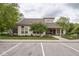 Community clubhouse featuring ample parking and mature trees at 1046 Timber Creek Dr # 3, Carmel, IN 46032