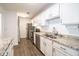 Bright kitchen with stainless steel appliances, granite countertops, and white cabinetry at 1046 Timber Creek Dr # 3, Carmel, IN 46032