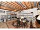 Organized basement featuring sturdy metal shelving, a bright overhead lighting, and versatile space for storage or recreation at 10713 Stable Dr, Indianapolis, IN 46239