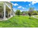 Spacious backyard with covered patio, providing a seamless transition to outdoor enjoyment at 1118 Kristi Ct, Greenwood, IN 46142