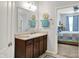Bathroom featuring vanity and sink, decorative towels and doorway to bedroom at 1118 Kristi Ct, Greenwood, IN 46142