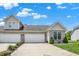 Beautiful home with a spacious driveway leading to a two-car garage and a manicured front lawn at 1118 Kristi Ct, Greenwood, IN 46142