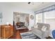 Cozy living room featuring a comfortable sofa and an open view to the dining room at 1118 Kristi Ct, Greenwood, IN 46142