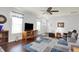 Bright and airy living room with hardwood floors, neutral walls, and a view of the entryway at 1118 Kristi Ct, Greenwood, IN 46142