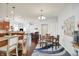Open concept living space with view of kitchen, bar seating and view of dining area at 1118 Kristi Ct, Greenwood, IN 46142