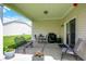 Cozy covered patio with seating, perfect for relaxing and entertaining outdoors at 1118 Kristi Ct, Greenwood, IN 46142