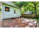 Backyard view of an outdoor wooden deck and exterior of home at 1124 E 35Th St, Indianapolis, IN 46205