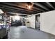 Spacious unfinished basement with painted ceilings, shelving, and concrete floors at 1124 E 35Th St, Indianapolis, IN 46205