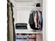 Neatly organized closet with shelving and hanging space for clothes and storage at 1124 E 35Th St, Indianapolis, IN 46205