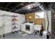Unfinished laundry room in basement with washer, dryer, and utility sink at 1124 E 35Th St, Indianapolis, IN 46205