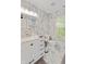 This bathroom features marble countertops and a white cabinet and modern sink at 11243 Catalina Dr, Fishers, IN 46038