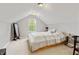 Bedroom with neutral paint, carpet flooring, a bed, and lots of natural light at 11243 Catalina Dr, Fishers, IN 46038