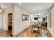 Open-concept dining area, seamlessly connecting to living room and kitchen for easy living and entertaining at 11243 Catalina Dr, Fishers, IN 46038