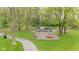 Community playground with lush greenery, offering a safe and fun environment for children to play and explore at 11243 Catalina Dr, Fishers, IN 46038