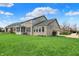 Large backyard features a well maintained lawn with mature trees surrounding at 11323 Still Creek Dr, Zionsville, IN 46077