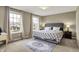 Bedroom with neutral walls, carpet, and an area rug at 11323 Still Creek Dr, Zionsville, IN 46077
