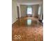 Bright living room featuring parquet floors and natural light at 1138 E 58Th St, Indianapolis, IN 46220