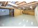 Spacious unfinished basement with visible beams and utilities, ready for customization at 11473 Rainbow Falls Ln, Fishers, IN 46037