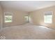 Spacious bedroom with ample natural light and neutral carpet at 11473 Rainbow Falls Ln, Fishers, IN 46037