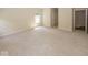 Large bedroom with neutral carpet and a view out the window at 11473 Rainbow Falls Ln, Fishers, IN 46037