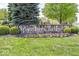 Spyglass Falls community entrance sign with colorful flower bed and landscaping at 11473 Rainbow Falls Ln, Fishers, IN 46037