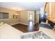 Well-lit kitchen features wood floors and stainless steel appliances at 11473 Rainbow Falls Ln, Fishers, IN 46037