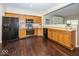 Bright kitchen with stainless steel appliances and wood cabinetry at 11473 Rainbow Falls Ln, Fishers, IN 46037
