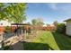 Well maintained backyard with a lush green lawn, featuring a garden area and privacy fence, offers a serene outdoor space at 1157 Fielding Ln, Franklin, IN 46131