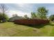 Large, grassy backyard with a wooden privacy fence providing ample space for outdoor activities and seclusion at 1157 Fielding Ln, Franklin, IN 46131