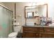 Bathroom featuring standing shower, white vanity sink, and storage shelves at 1157 Fielding Ln, Franklin, IN 46131