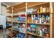 View of pantry featuring wooden shelving stocked with storage items at 1157 Fielding Ln, Franklin, IN 46131