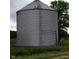 Large corrugated metal silo with a small structure to the right at 1170 E 400 S, Lebanon, IN 46052