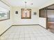Bright dining area with tile floors and natural lighting at 1209 S Rangeline Rd, Anderson, IN 46012