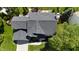 Aerial view of the house highlighting the roof, driveway, and surrounding green landscape at 12115 Flagstone Dr, Fishers, IN 46037