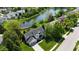 Charming home nestled next to a serene pond and surrounded by lush greenery at 12115 Flagstone Dr, Fishers, IN 46037