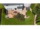 Aerial view of the backyard showcasing deck, patio, hot tub, and lush landscaping at 12115 Flagstone Dr, Fishers, IN 46037