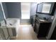 Bathroom featuring a bathtub and stylish vanity with natural lighting at 12115 Flagstone Dr, Fishers, IN 46037