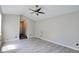 Bedroom with neutral walls, wood floors, and ceiling fan at 12115 Flagstone Dr, Fishers, IN 46037