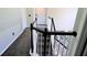 Carpeted staircase with dark railing provides access to the upper level of the home at 12115 Flagstone Dr, Fishers, IN 46037