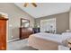 Bright and airy bedroom with a vaulted ceiling, featuring large windows and neutral decor, creating a peaceful retreat at 12256 Sagamore Woods Dr, Fishers, IN 46037