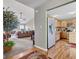 Open-concept living space showcasing a neutral color palette with a view into the kitchen and adjacent living room at 12256 Sagamore Woods Dr, Fishers, IN 46037