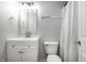 Clean bathroom featuring a white vanity and fixtures, providing a fresh and inviting space at 1242 Freemont Ln, Greenwood, IN 46143