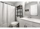 Well-lit bathroom with shelving, modern fixtures, and a clean design at 1242 Freemont Ln, Greenwood, IN 46143