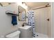 This updated bathroom features a shower and updated vanity at 129 Rosewood Dr, Cicero, IN 46034